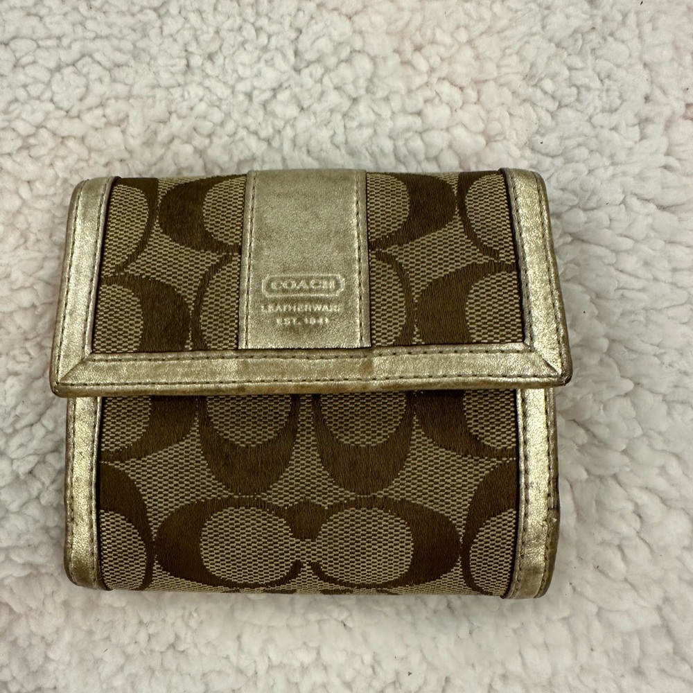 Gently used vintage coach wallet in classic colours